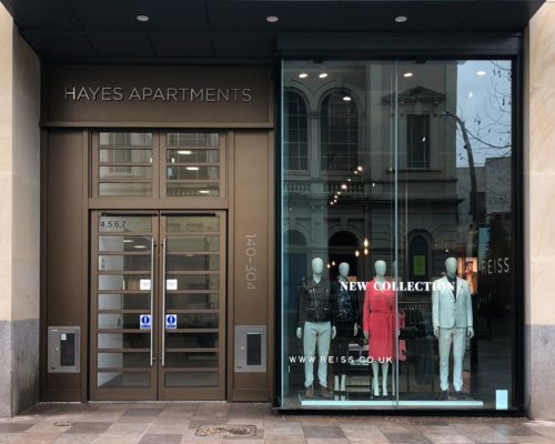 Senior SD commercial doors to a luxury clothes shop