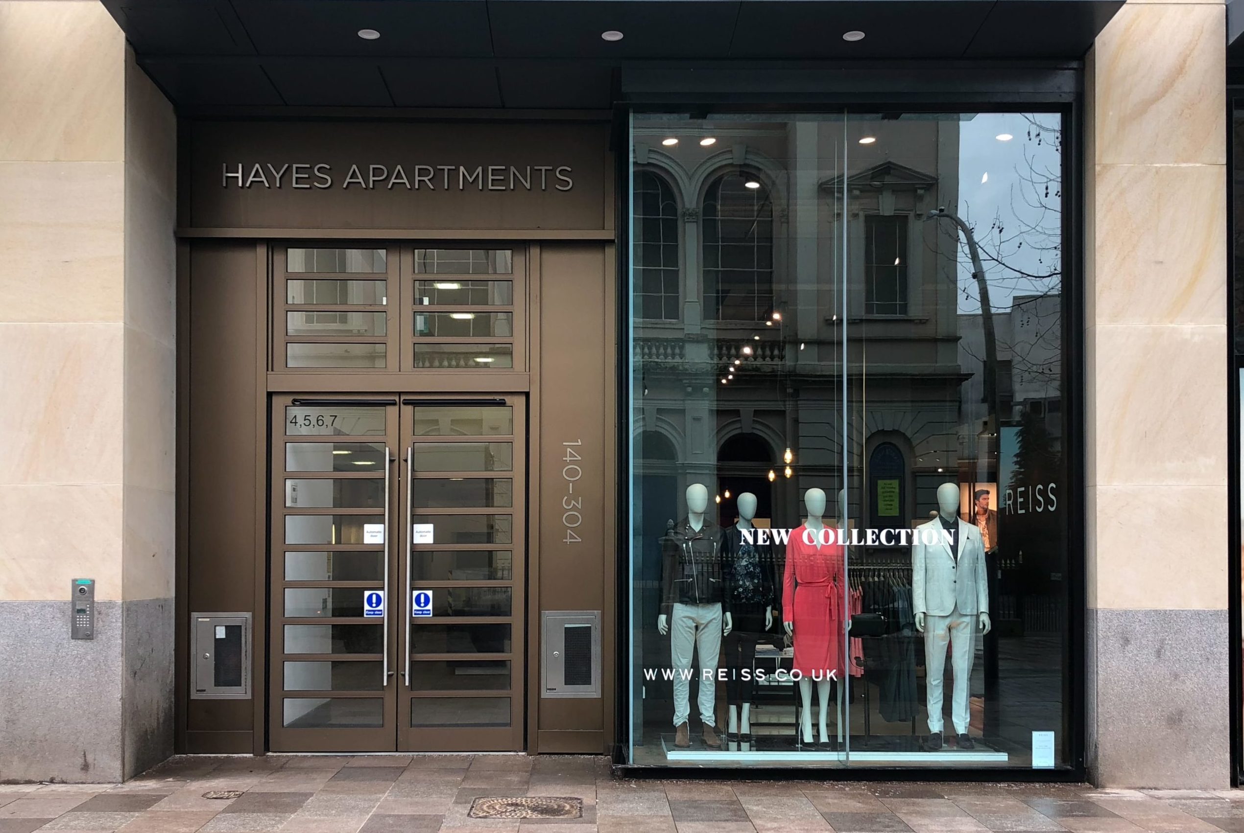Senior SD commercial doors to a luxury clothes shop