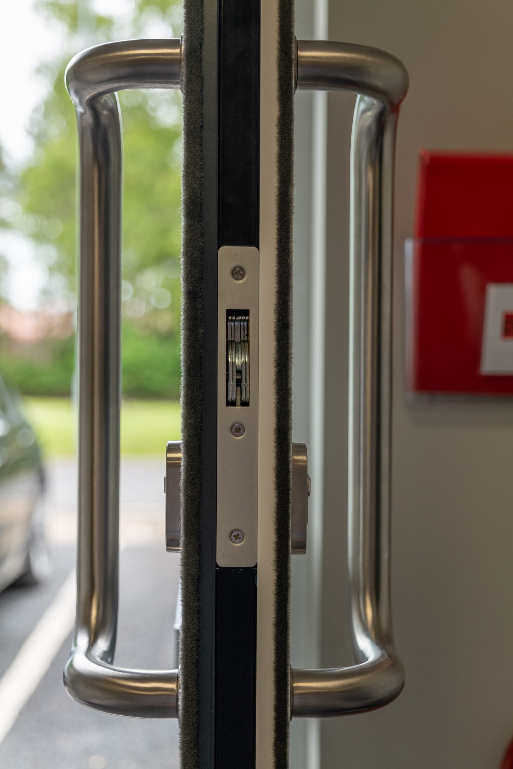 commercial door handles on an open office door