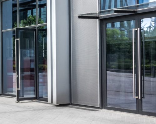 commercial door hardware on modern office doors