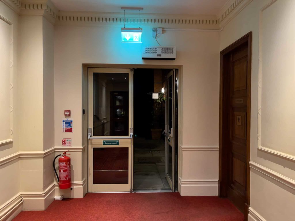 aluminium fire exit doors in a hotel corridor