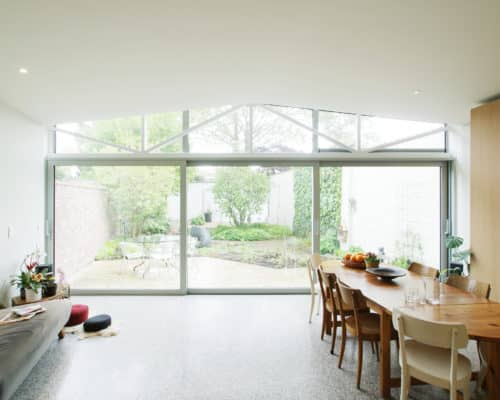 Reynaers MasterPatio sliding doors in white, designed into a white new house