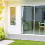 VELFAC patio doors in white outside view with matching window